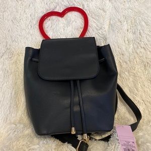 Very cute new with tags back pack pack/purse